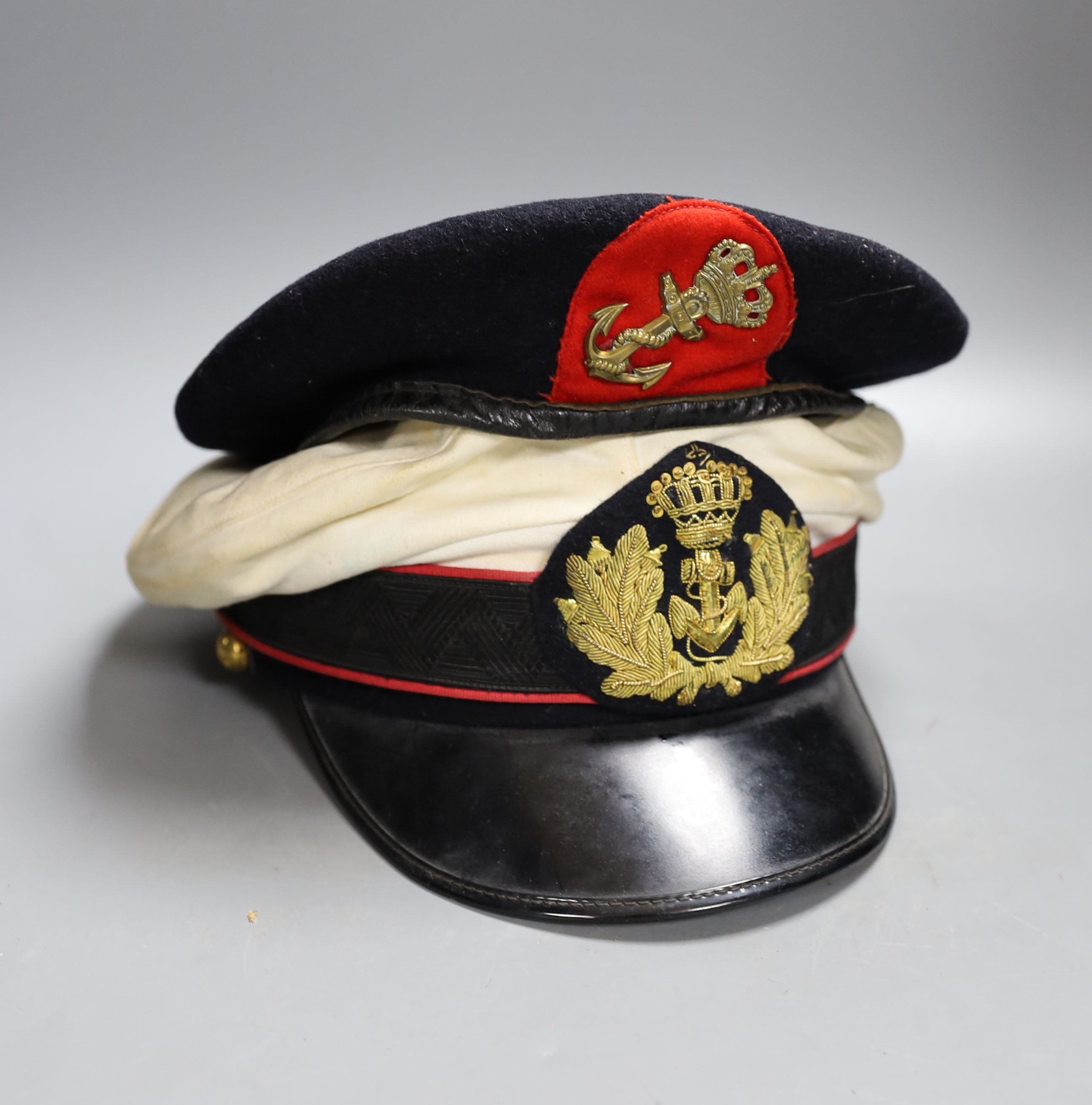 Two military caps and a tie